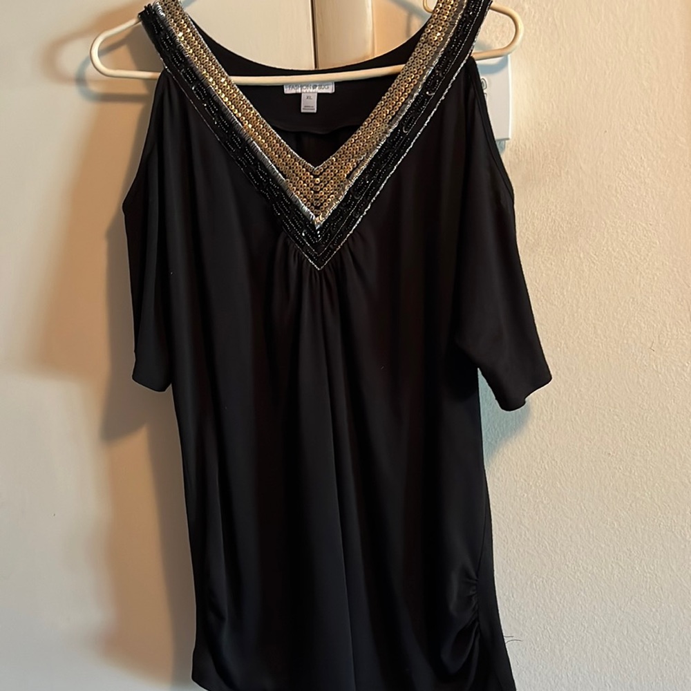 Black dressy cold shoulder top.